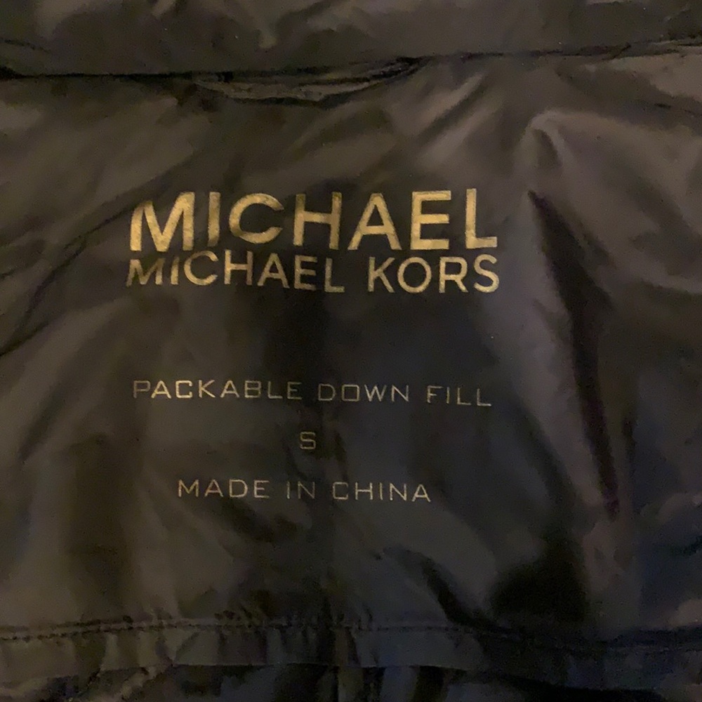 Michael Kors women’s jacket size small very condition no rips or holes.